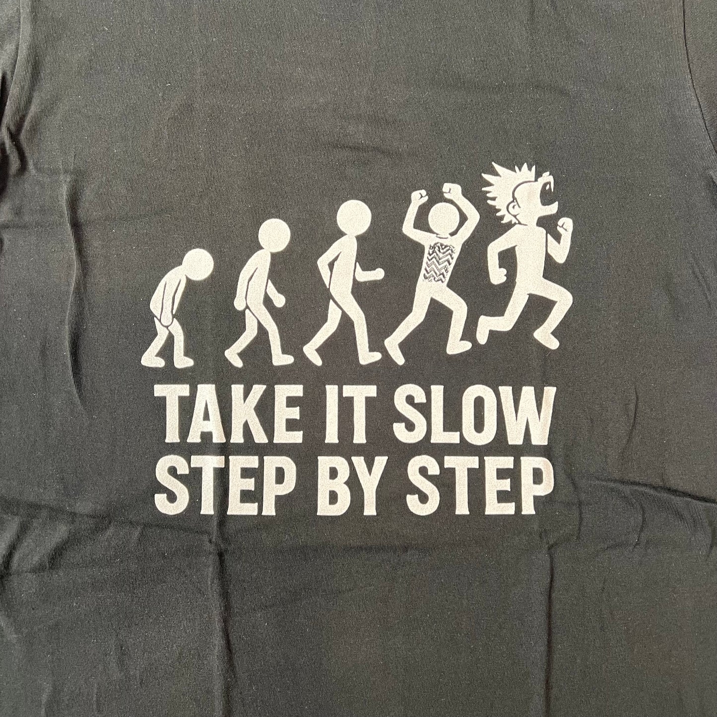 ゆっくりで良い、前に進め Tシャツ