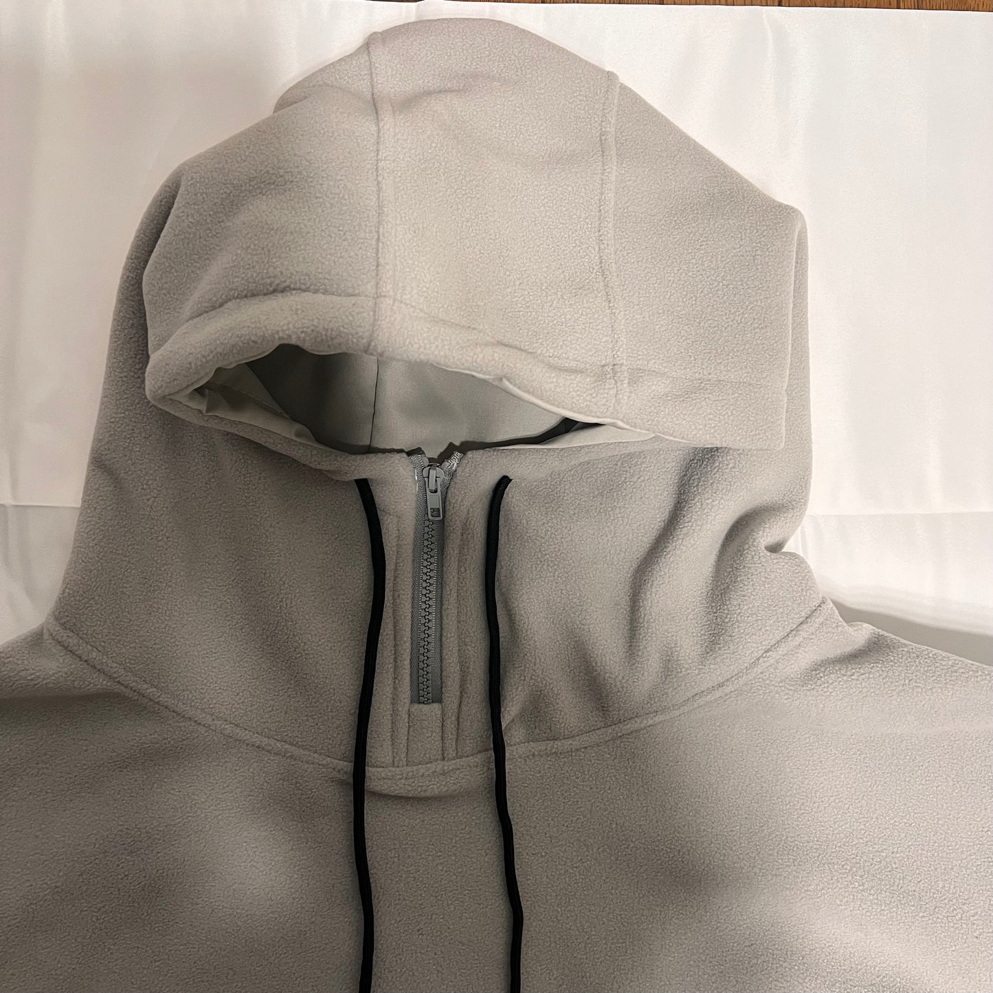 フリースハーフジップフード付きパーカー